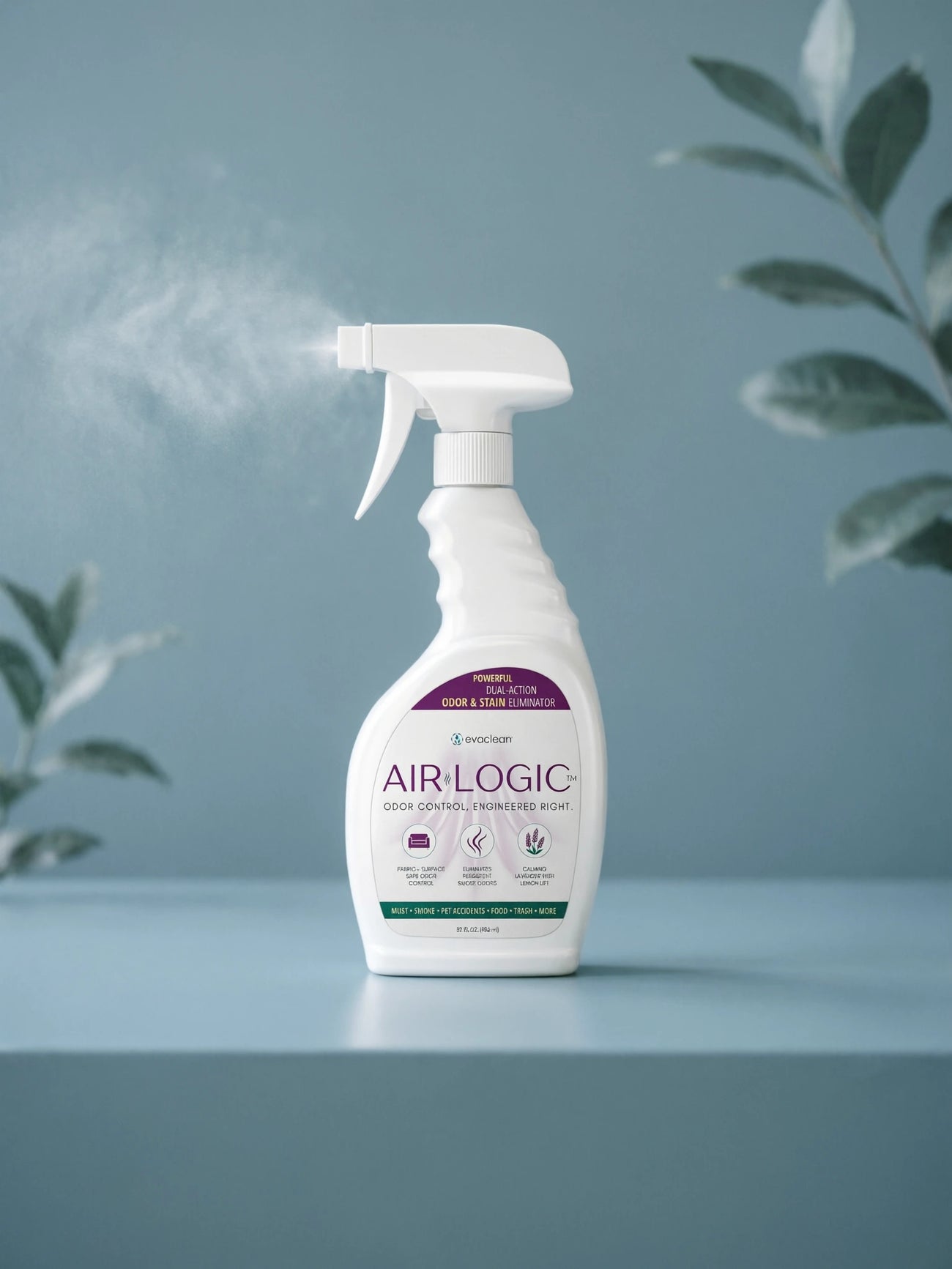 Airlogic odor eliminator spray bottle with mist on a blurry light blue background
