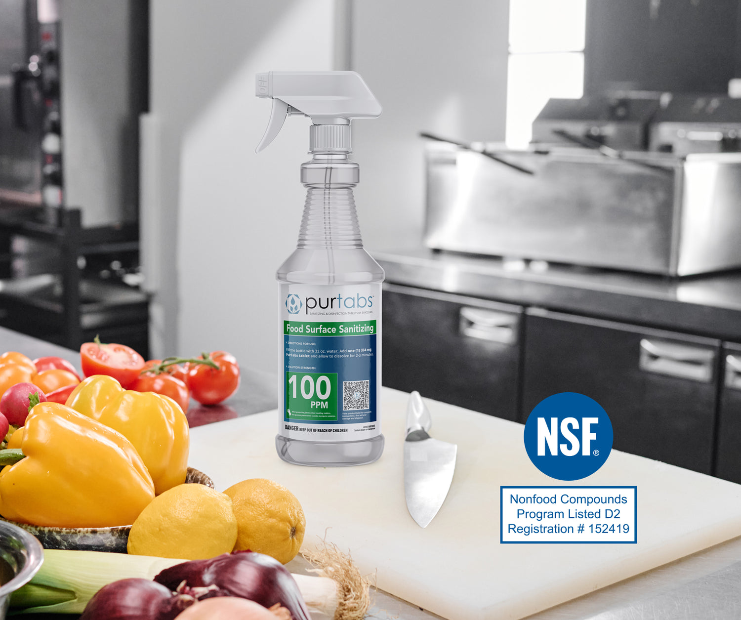 spray bottle of PurTabs on food prep counter in kitchen with NSF D2 logo