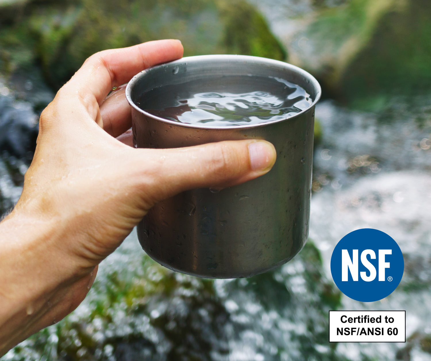hand holding cup of water with NSF certified logo